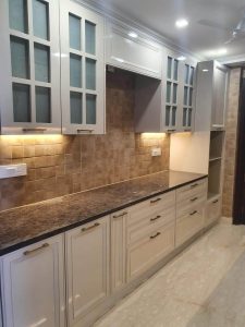 Open kitchen design with an island and pendant lighting