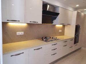 Contemporary modular kitchen with a minimalist layout.