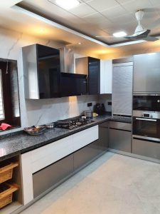 Open kitchen design with an island and pendant lighting
