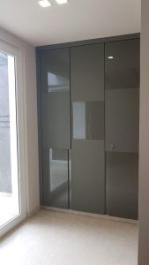 Sleek modular wardrobe with sliding doors.