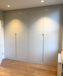 Sleek modular wardrobe with sliding doors.